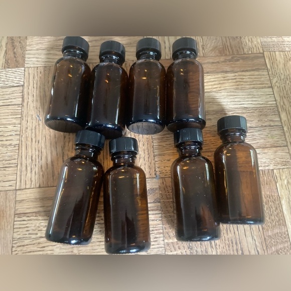Essential oil bottles. 8 bottles included. Will need cleaned out - Picture 1 of 3